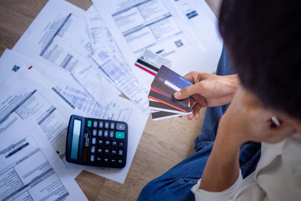 Business people are stressed about credit card debt and many bil