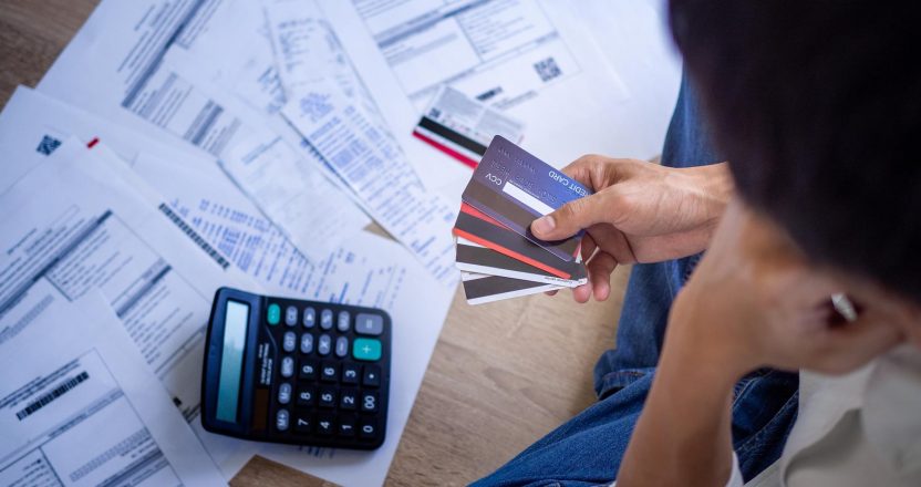 Business people are stressed about credit card debt and many bil