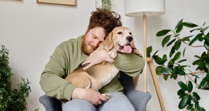 Owner enjoying the company of his dog