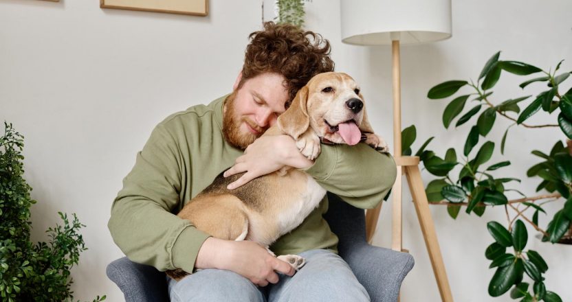 Owner enjoying the company of his dog