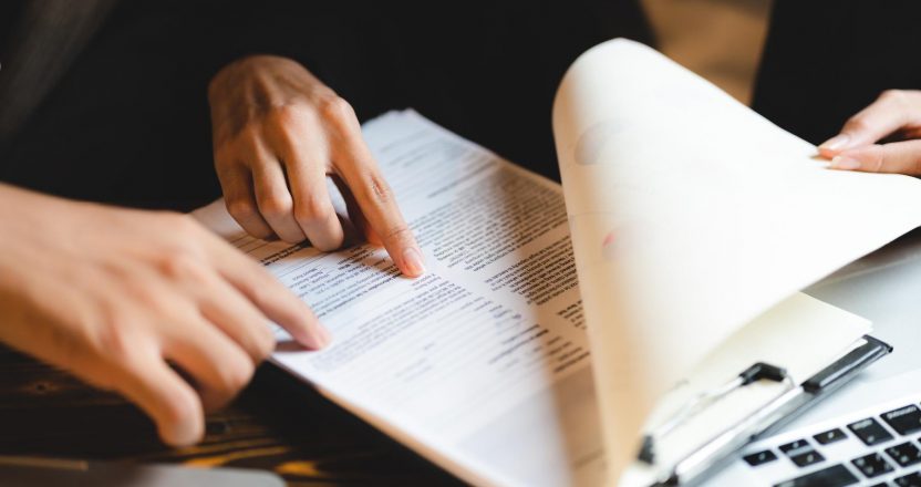 business approve and certificate concept, confirmation of business marketing document permit and certified stamping, signing on business partner paper to success, or concept of attorney and insurance
