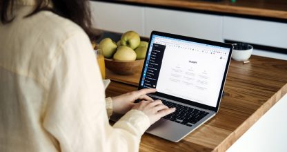 ChatGPT for content creators, ChatGPT help generate ideas and create content. Screen with ChatGPT AI or artificial intelligence chat and typing female hands. Warsaw, Poland - May 02, 2023