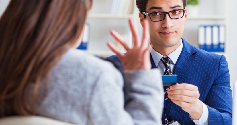 Woman makes payment with credit card